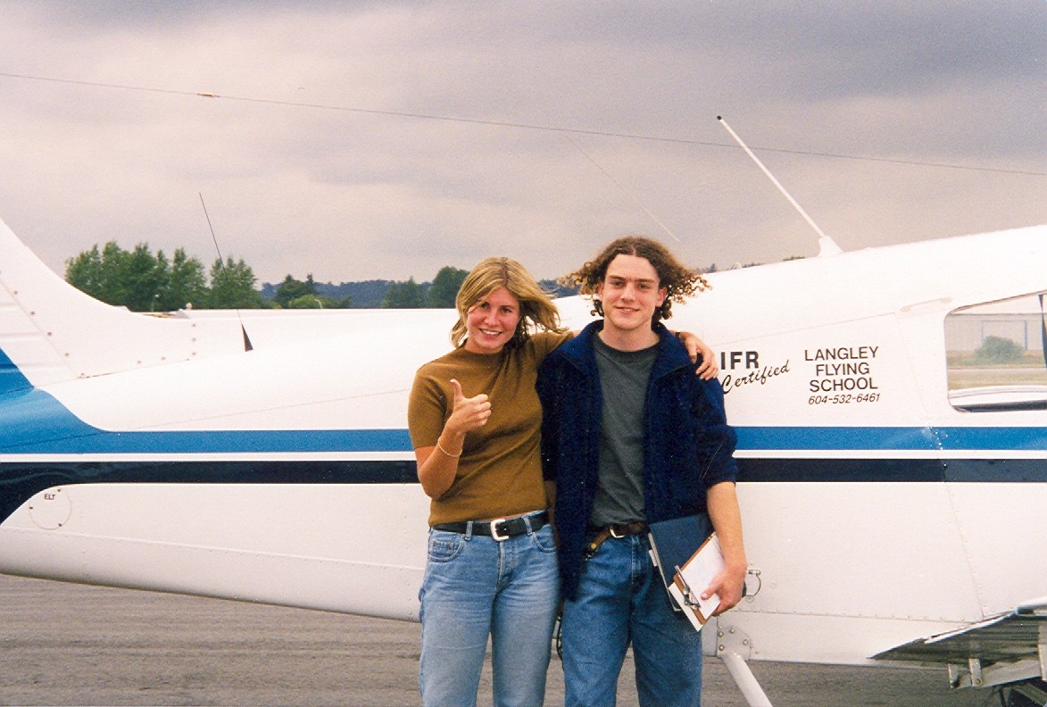 Ben Orlowski with Flight Instructor Heather Wolf, following his First Solo Flight in Cherokee GNIC.  Langley Flying School.